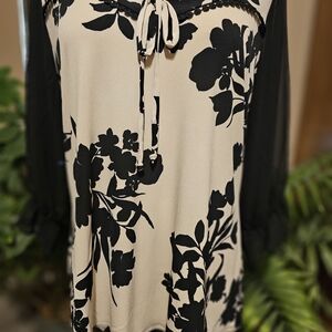 Elegant Black and Cream Floral Blouse